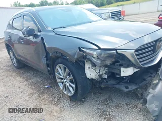 2018 Mazda CX-9 Grand Touring with VIN JM3TCADY7J0217595, listed as a IAAI auction lot 42381331 with 130,604 mi miles and . Bid and sale history available at DreamBid. Image 17.