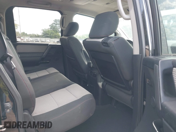 2011 Nissan Titan SL z VIN 1N6AA0EC4BN317674, wystawiony jako IAAI lot #42523569 z przebiegiem 208 045 mil mil oraz . Historia ofert i sprzedaży dostępna na DreamBid. Obrazek 8.