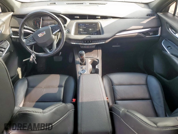 2021 Cadillac XT4 FWD Luxury z VIN 1GYAZAR49MF084676, wystawiony jako Copart lot #59765515 z przebiegiem 32 480 mil mil oraz Czysty tytuł • Clean title. Historia ofert i sprzedaży dostępna na DreamBid. Obrazek 8.