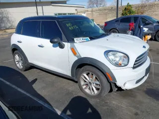 2014 MINI Countryman with VIN WMWZB3C53EWR39767, listed as a IAAI auction lot 41592112 with 129,403 mi miles and . Bid and sale history available at DreamBid. Image 1.