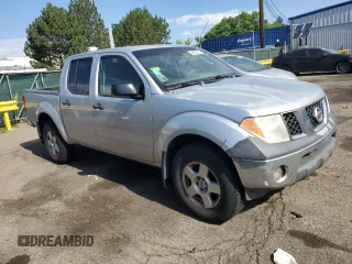 2007 Nissan Frontier Nismo with VIN 1N6AD07W17C401565, listed as a Copart auction lot 64868285 with 201,327 mi miles and Clean title. Bid and sale history available at DreamBid. Image 4.