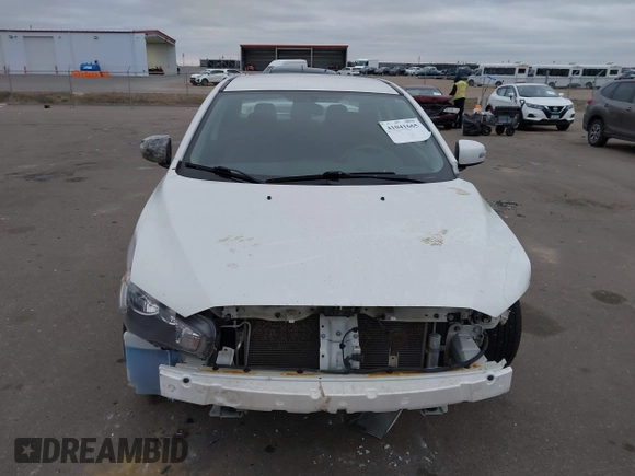 2016 Mitsubishi Lancer SE with VIN JA32V2FWXGU003619, listed as a IAAI auction lot 41041665 with 98,627 mi miles. Bid and sale history available at carsss.com. Image 12.