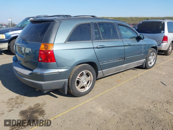 2005 Chrysler Pacifica Touring with VIN 2C4GM68445R651173, listed as a IAAI auction lot 41447054 with 294,074 mi miles and . Bid and sale history available at DreamBid. Image 4.