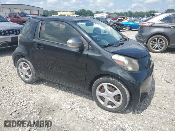 2014 Scion iQ with VIN JTNJJXB07EJ028558, listed as a Copart auction lot 64745345 with 112,221 mi miles and Clean title. Bid and sale history available at DreamBid. Image 4.