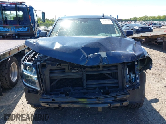 2020 Chevrolet Tahoe LT with VIN 1GNSKBKC6LR239081, listed as a IAAI auction lot 42298842 with 125,328 mi miles and . Bid and sale history available at DreamBid. Image 12.