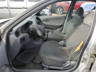 1999 Hyundai Elantra z VIN KMHJF25F8XU852123, wystawiony jako Copart lot #72284584 z przebiegiem 12 750 mil mil oraz Czysty tytuł • Clean title. Historia ofert i sprzedaży dostępna na DreamBid. Obrazek 7.