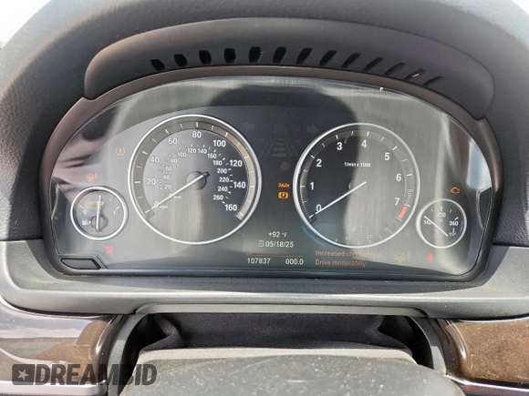 2016 BMW 5 Series 528i with VIN WBA5A5C59GD528109, listed as a Copart auction lot 61691405 with 107,837 mi miles and Salvage title. Bid and sale history available at DreamBid. Image 9.