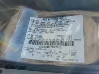 2007 Ford Focus S z VIN 1FAHP34N77W192231, wystawiony jako Copart lot #59020505 z przebiegiem 99 284 mil mil oraz Szkoda całkowita • Salvage title. Historia ofert i sprzedaży dostępna na DreamBid. Obrazek 12.