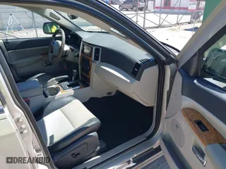 2009 Jeep Grand Cherokee Limited with VIN 1J8HR58P49C507978, listed as a IAAI auction lot 41832452 with 145,371 mi miles. Bid and sale history available at carsss.com. Image 5.