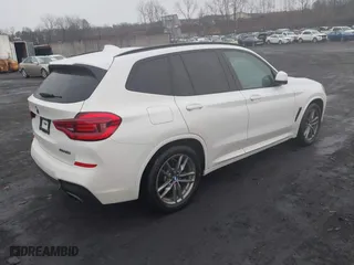 2021 BMW X3 M40i with VIN 5UXTY9C07M9F32001, listed as a IAAI auction lot 41673270 with 45,752 mi miles. Bid and sale history available at carsss.com. Image 4.