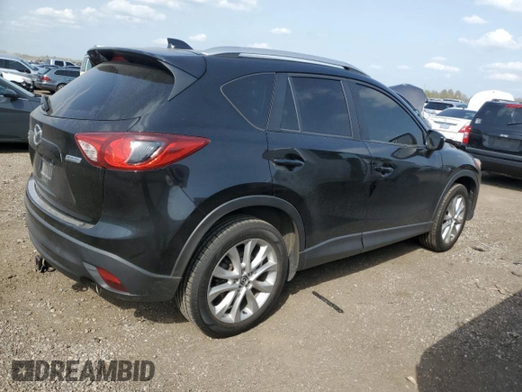 2015 Mazda CX-5 Grand Touring with VIN JM3KE4DY9F0516357, listed as a Copart auction lot 53156215 with 118,621 mi miles and Salvage Title. Bid and sale history available at DreamBid. Image 3.