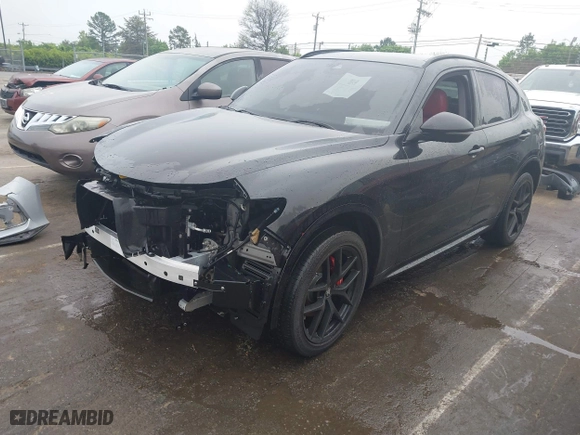 2021 Alfa Romeo Stelvio Ti with VIN ZASPAKBN9M7D09213, listed as a IAAI auction lot 41812289 with 38,410 mi miles. Bid and sale history available at carsss.com. Image 22.