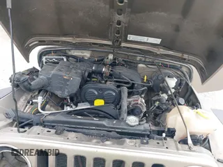 2003 Jeep Wrangler SE with VIN 1J4FA29113P304250, listed as a IAAI auction lot 40917099 with 191,589 mi miles. Bid and sale history available at carsss.com. Image 10.