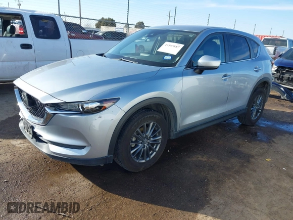 2020 Mazda CX-5 Touring with VIN JM3KFACM1L0789394, listed as a IAAI auction lot 41565887 with 73,730 mi miles. Bid and sale history available at carsss.com. Image 2.