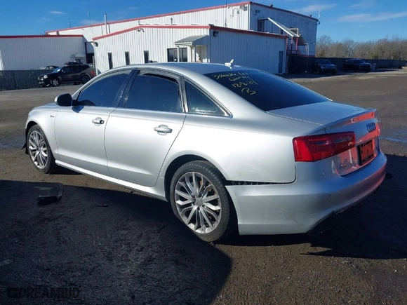 2014 Audi A6 3.0T Prestige with VIN WAUHGAFC9EN101728, listed as a IAAI auction lot 41077354 with 60,485 mi miles. Bid and sale history available at carsss.com. Image 3.