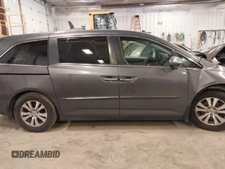 2016 Honda Odyssey SE with VIN 5FNRL5H38GB039652, listed as a IAAI auction lot 41985520 with Not Provided miles and . Bid and sale history available at DreamBid. Image 13.
