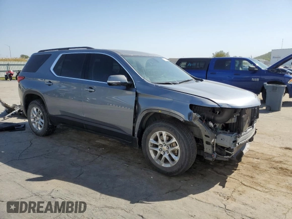 2020 Chevrolet Traverse LT Cloth with VIN 1GNERGKW8LJ282450, listed as a Copart auction lot 73414484 with 56,264 mi miles and Salvage title. Bid and sale history available at DreamBid. Image 4.