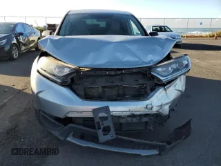 2018 Honda CR-V LX z VIN 2HKRW6H3XJH203604, wystawiony jako Copart lot #89002705 z przebiegiem 77 628 mil mil oraz Szkoda całkowita • Salvage title. Historia ofert i sprzedaży dostępna na DreamBid. Obrazek 5.