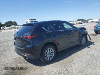 2023 Mazda CX-5 S Carbon Edition z VIN JM3KFBCM3P0264493, wystawiony jako Copart lot #52118475 z przebiegiem 3 195 mil mil oraz Szkoda całkowita • Salvage title. Historia ofert i sprzedaży dostępna na DreamBid. Obrazek 3.