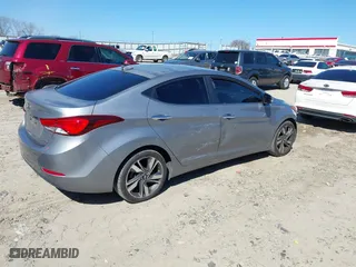 2014 Hyundai Elantra SE with VIN KMHDH4AE7EU032788, listed as a IAAI auction lot 41638876 with 135,943 mi miles. Bid and sale history available at carsss.com. Image 4.
