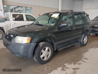 2003 Ford Escape XLS Popular with VIN 1FMYU02143KC35891, listed as a IAAI auction lot 41599760 with 148,381 mi miles. Bid and sale history available at carsss.com. Image 2.
