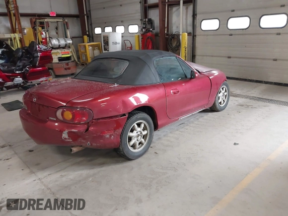 2001 Mazda MX-5 Miata with VIN JM1NB353X10215794, listed as a IAAI auction lot 42092359 with 121,684 mi miles and . Bid and sale history available at DreamBid. Image 4.