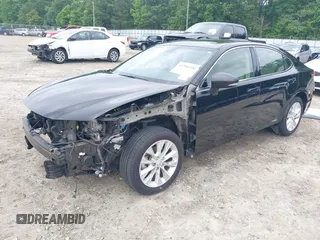 2014 Lexus ES 300h with VIN JTHBW1GGXE2074004, listed as a IAAI auction lot 42206490 with 79,725 mi miles and . Bid and sale history available at DreamBid. Image 2.
