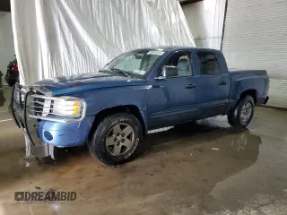 2005 Dodge Dakota SLT with VIN 1D7HW48N35S249127, listed as a Copart auction lot 86543244 with 215,435 mi miles and Salvage Title. Bid and sale history available at carsss.com. Image 1.