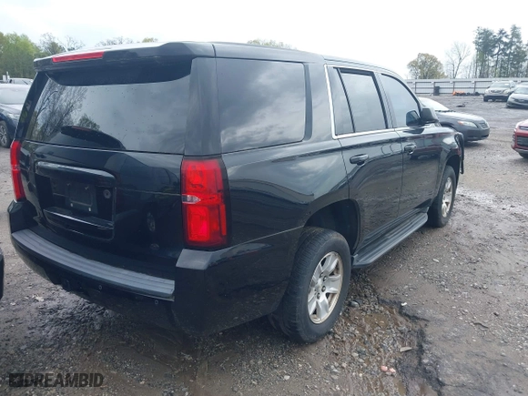 2016 Chevrolet Tahoe Commercial with VIN 1GNLCDEC0GR260524, listed as a IAAI auction lot 41923506 with 247,671 mi miles. Bid and sale history available at carsss.com. Image 4.