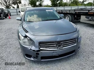 2010 Nissan Maxima SV z VIN 1N4AA5AP0AC829036, wystawiony jako Copart lot #56487895 z przebiegiem 117 783 mil mil oraz Szkoda całkowita • Salvage title. Historia ofert i sprzedaży dostępna na DreamBid. Obrazek 13.