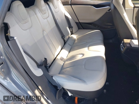 2014 Tesla Model S 60 with VIN 5YJSA1S11EFP35998, listed as a IAAI auction lot 42316563 with 83,835 mi miles and . Bid and sale history available at DreamBid. Image 8.
