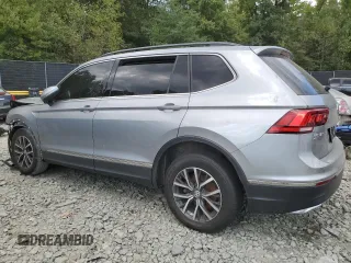 2020 Volkswagen Tiguan SE with VIN 3VV2B7AX4LM022562, listed as a Copart auction lot 69816034 with 61,789 mi miles and Salvage Title. Bid and sale history available at DreamBid. Image 2.