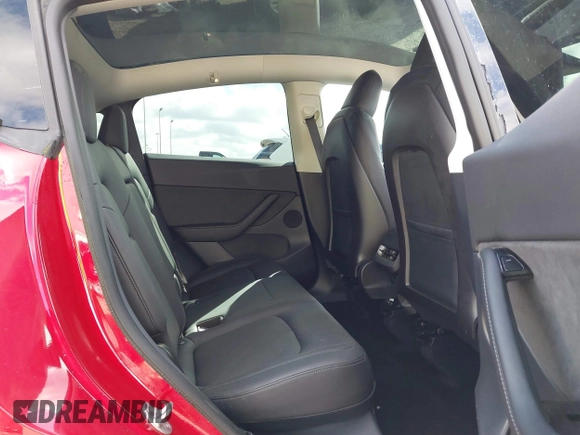 2020 Tesla Model Y Long Range with VIN 5YJYGDEE9LF009957, listed as a IAAI auction lot 41780248 with 31,053 mi miles and . Bid and sale history available at DreamBid. Image 8.
