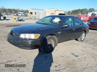 2001 Toyota Camry CE with VIN 4T1BG22K41U842473, listed as a IAAI auction lot 41858322 with 203,696 mi miles. Bid and sale history available at carsss.com. Image 17.