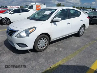 2016 Nissan Versa S Plus with VIN 3N1CN7AP9GL831693, listed as a IAAI auction lot 41530243 with 104,323 mi miles. Bid and sale history available at carsss.com. Image 2.