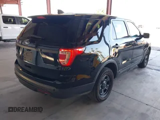 2016 Ford Police Interceptor Utility z VIN 1FM5K8AR9GGA19543, wystawiony jako IAAI lot #42487425 z przebiegiem 194 721 mil mil oraz . Historia ofert i sprzedaży dostępna na DreamBid. Obrazek 4.