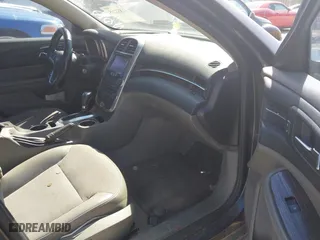 2014 Chevrolet Malibu LT with VIN 1G11E5SL2EF258804, listed as a IAAI auction lot 41832285 with 232,457 mi miles. Bid and sale history available at carsss.com. Image 5.