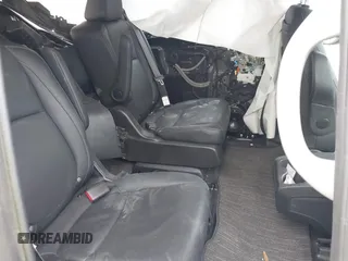 2023 Honda Odyssey Touring with VIN 5FNRL6H81PB068721, listed as a IAAI auction lot 41489618 with 20,202 mi miles and . Bid and sale history available at DreamBid. Image 8.