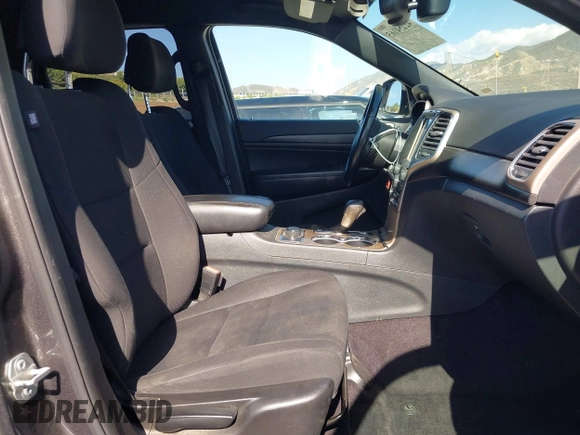 2016 Jeep Grand Cherokee Laredo z VIN 1C4RJFAG5GC390413, wystawiony jako IAAI lot #42254165 z przebiegiem 99 231 mil mil oraz . Historia ofert i sprzedaży dostępna na DreamBid. Obrazek 5.