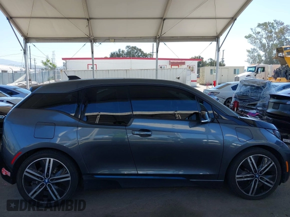 2017 BMW i3 with VIN WBY1Z8C5XHV551484, listed as a IAAI auction lot 42293232 with 74,082 mi miles and . Bid and sale history available at DreamBid. Image 13.