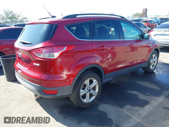 2015 Ford Escape SE with VIN 1FMCU0GX3FUC80207, listed as a IAAI auction lot 41665897 with 153,891 mi miles. Bid and sale history available at carsss.com. Image 4.