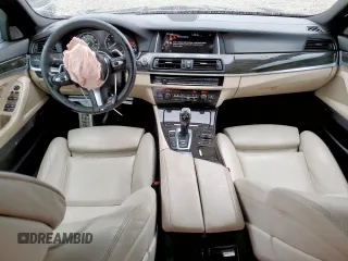 2015 BMW 5 Series 550i with VIN WBAKN9C59FD961491, listed as a Copart auction lot 60208745 with 70,241 mi miles and Salvage title. Bid and sale history available at DreamBid. Image 8.