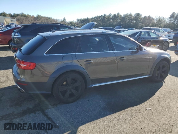 2014 Audi allroad Premium Plus with VIN WA1UFAFL0EA143999, listed as a Copart auction lot 82145704 with 157,411 mi miles and Clean Title. Bid and sale history available at carsss.com. Image 3.