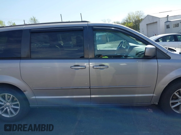 2015 Dodge Grand Caravan SXT with VIN 2C4RDGCG2FR540431, listed as a IAAI auction lot 42133044 with 245,977 mi miles and . Bid and sale history available at DreamBid. Image 13.