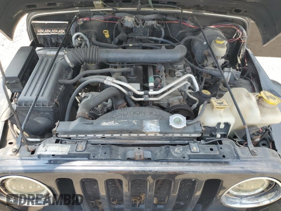 2005 Jeep Wrangler X z VIN 1J4FA39S75P321328, wystawiony jako Copart lot #59711505 z przebiegiem 126 768 mil mil oraz Szkoda całkowita • Salvage title. Historia ofert i sprzedaży dostępna na DreamBid. Obrazek 12.