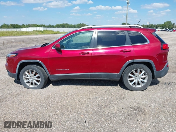 2014 Jeep Cherokee Limited with VIN 1C4PJMDB7EW165272, listed as a IAAI auction lot 35106260 with 102,934 mi miles and . Bid and sale history available at DreamBid. Image 14.