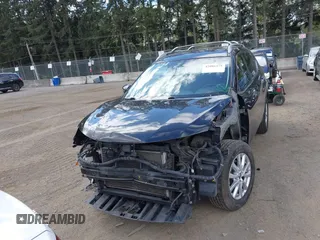 2018 Nissan Rogue SV with VIN KNMAT2MV5JP593778, listed as a IAAI auction lot 42086275 with 133,175 mi miles. Bid and sale history available at carsss.com. Image 13.