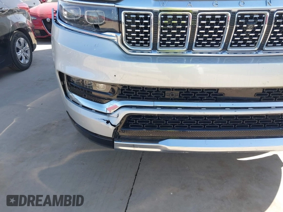2023 Jeep Grand Wagoneer with VIN 1C4SJVEJ4PS511567, listed as a IAAI auction lot 41718847 with 36,004 mi miles and . Bid and sale history available at DreamBid. Image 17.