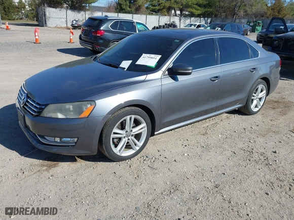 2013 Volkswagen Passat SE w/Sunroof with VIN 1VWBM7A30DC125919, listed as a IAAI auction lot 41759051 with 112,952 mi miles. Bid and sale history available at carsss.com. Image 2.