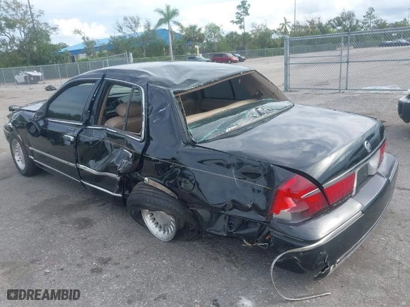1999 Mercury Grand Marquis LS with VIN 2MEFM75W8XX645350, listed as a IAAI auction lot 40713217 with 56,271 mi miles. Bid and sale history available at carsss.com. Image 12.